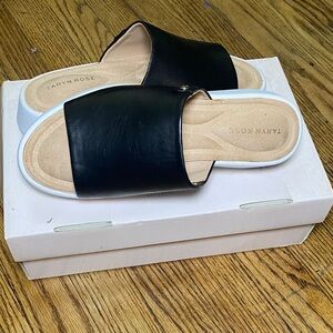 Taryn Rose Black and Cream Mules